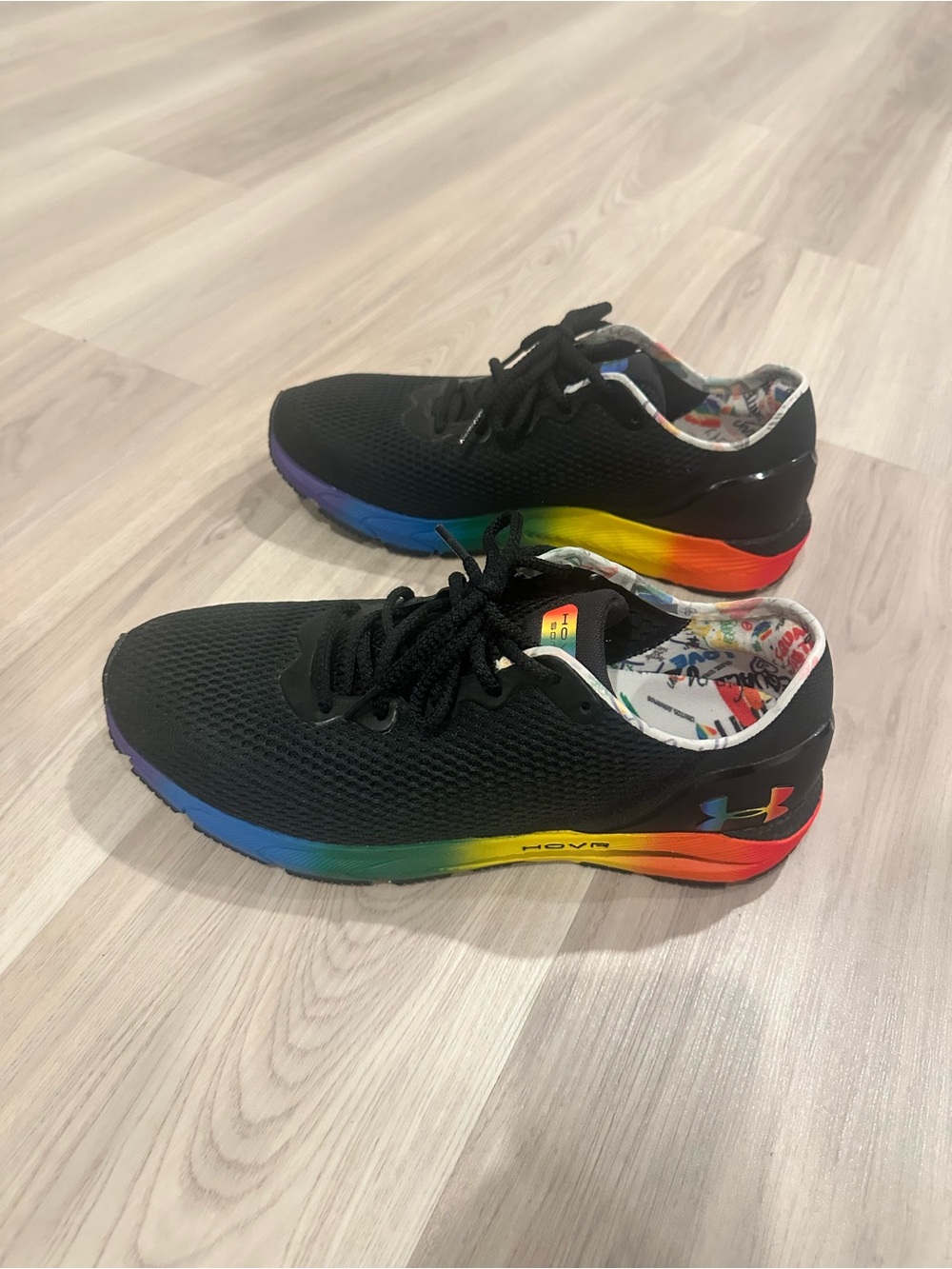Under Armour Men's Black Running Shoes with Rainbow Gradient Midsole